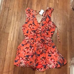 coral floral romper with tie back